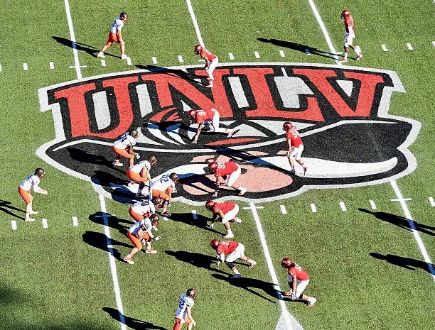 The Hey Reb! logo painted on the football field