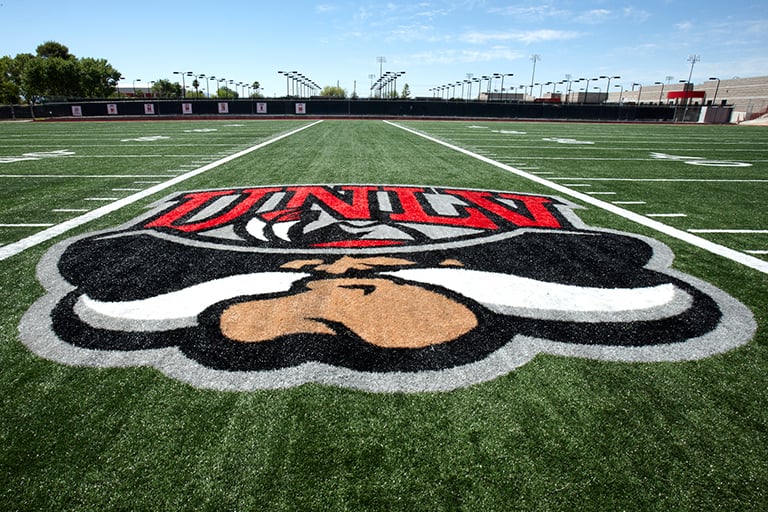 The Hey Reb! logo on the turf